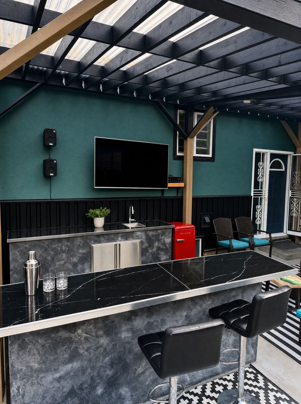 Outdoor bar and kitchen with TV